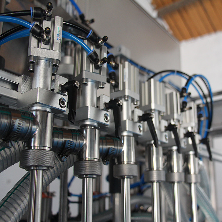  õlipudelite täitmise masin